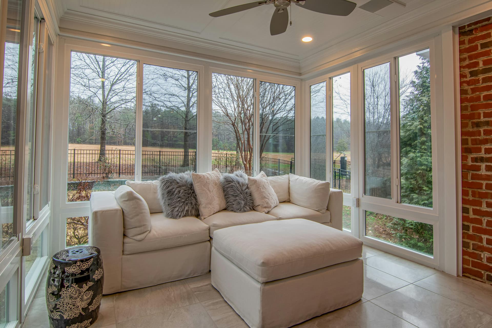 Sunroom Design Ideas with Sleek Aluminum Frames and Panoramic Views
