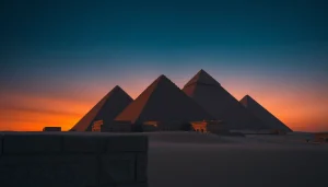 Captivating view of iconic piraminds against a twilight backdrop showcases their architectural marvel.